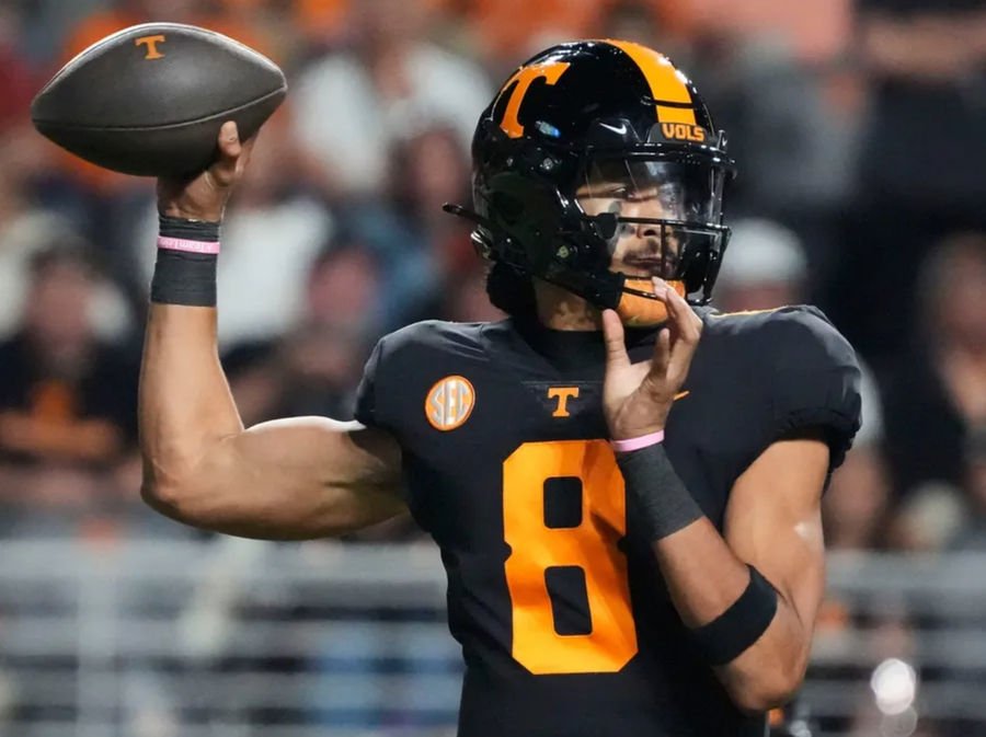 Nov 2, 2024; Knoxville, Tennessee, USA; Tennessee Volunteers quarterback Nico Iamaleava (8) throws against the Kentucky Wildcats during the first half at Neyland Stadium. Mandatory Credit: Saul Young/USA TODAY Network via Imagn Images