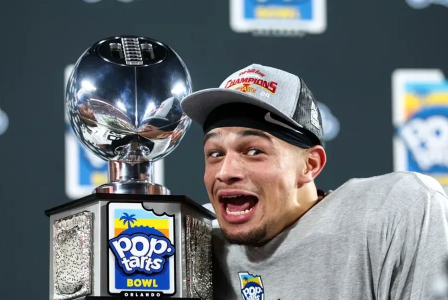 Dec 28, 2024; Orlando, FL, USA; Iowa State Cyclones wide receiver Jaylin Noel (13) celebrates after beating Miami Hurricanes in the Pop Tarts bowl at Camping World Stadium. Mandatory Credit: Nathan Ray Seebeck-Imagn Images