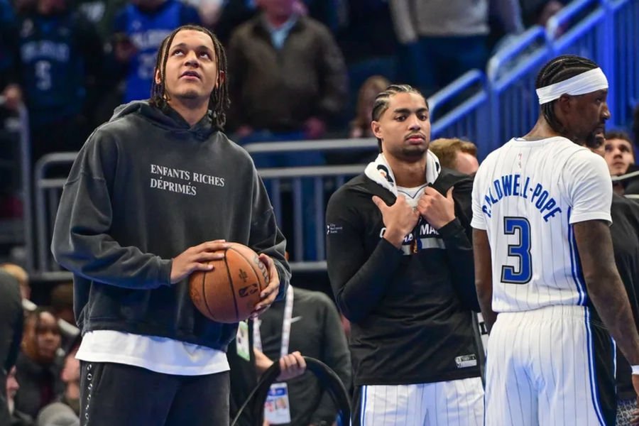 Dec 10, 2024; Milwaukee, Wisconsin, USA; Orlando Magic forward Paolo Banchero (5) looks on from the bench during game against the Milwaukee Bucks at Fiserv Forum. Mandatory Credit: Benny Sieu-Imagn Images