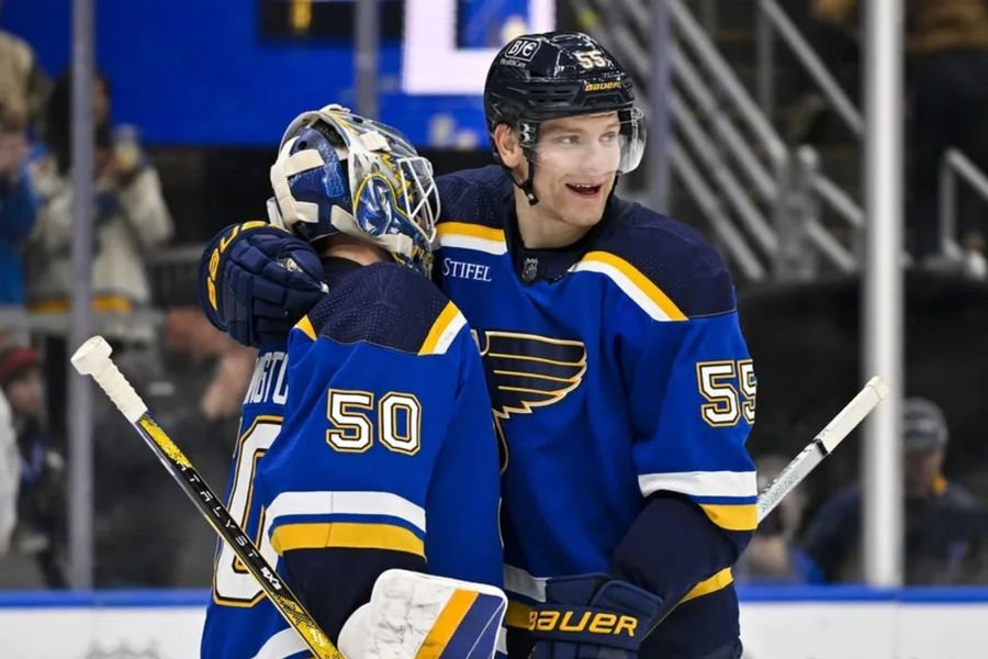 Nov 14, 2023; St. Louis, Missouri, USA; St. Louis Blues goaltender Jordan Binnington (50) and defenseman Colton Parayko (55) celebrate after the Blues defeated the Tampa Bay Lightning at Enterprise Center. credits: Jeff Curry-USA TODAY Sports